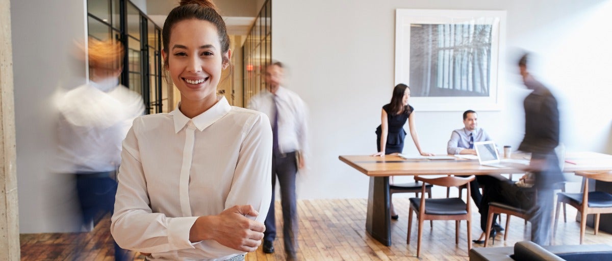 Woman professional with people in background