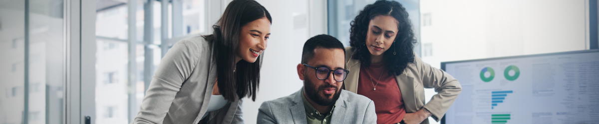 Three young professionals working together